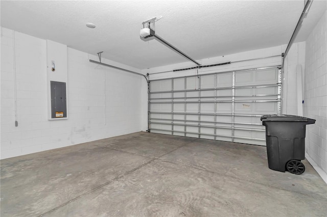 7223 SW 61st Pl, Ocala, FL 34474 - garage featuring electric panel, a garage door opener, and concrete block wall