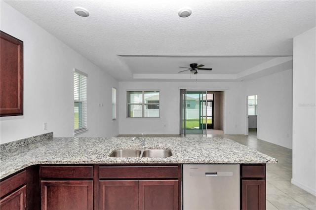 7223 SW 61st Pl, Ocala, FL 34474 - kitchen with dishwasher, open floor plan, ceiling fan, a peninsula, and reddish brown cabinets