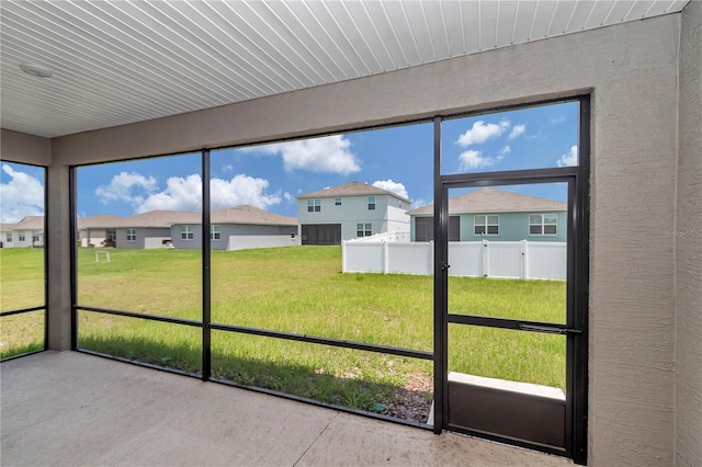 7223 SW 61st Pl, Ocala, FL 34474 - unfurnished sunroom featuring a residential view