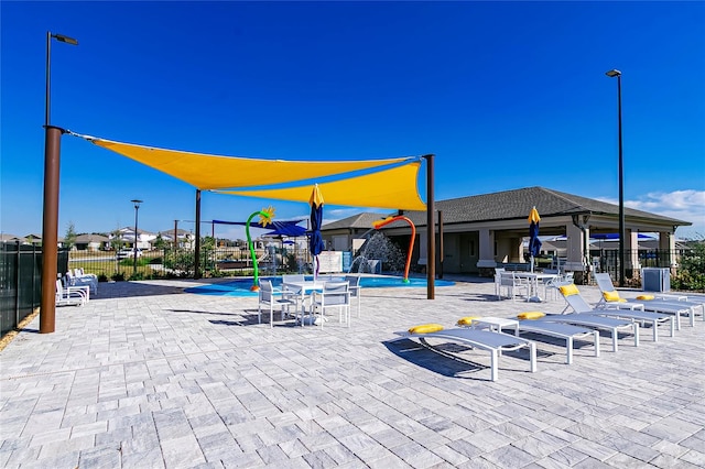 7223 SW 61st Pl, Ocala, FL 34474 - surrounding community featuring a pool and a patio