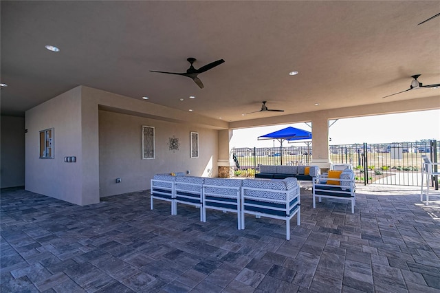 7223 SW 61st Pl, Ocala, FL 34474 - view of patio / terrace with outdoor lounge area and a ceiling fan