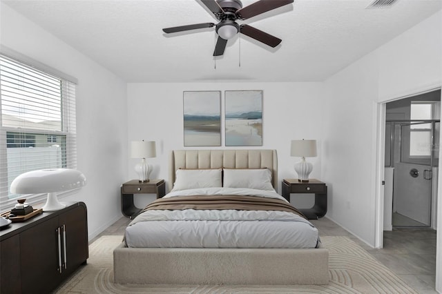 7223 SW 61st Pl, Ocala, FL 34474 - bedroom with a ceiling fan and a textured ceiling