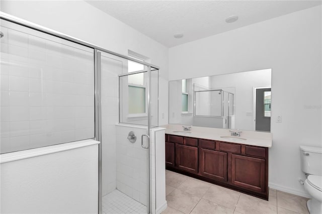 7223 SW 61st Pl, Ocala, FL 34474 - full bath with a shower stall, double vanity, and tile patterned floors
