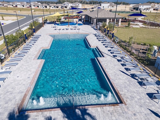7223 SW 61st Pl, Ocala, FL 34474 - community pool with a residential view and a patio