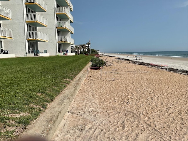 5201 S Atlantic Ave Unit 407A, New Smyrna Beach, FL 32169 - water view featuring nearby beach