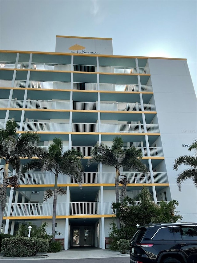 5201 S Atlantic Ave Unit 407A, New Smyrna Beach, FL 32169 - view of apartment building / complex