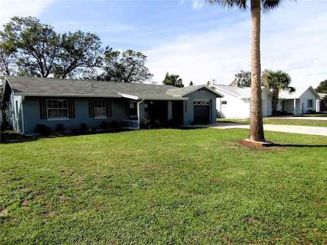 1920 Travelers Palm Dr, Edgewater, FL 32141 - single story home featuring concrete driveway, a garage, and a front lawn