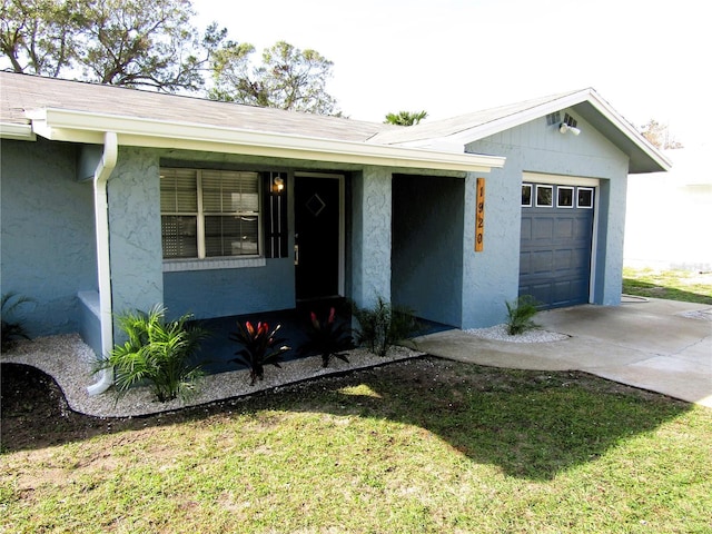 1920 Travelers Palm Dr, Edgewater, FL 32141 - ranch-style house with driveway and stucco siding