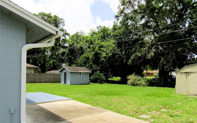 1920 Travelers Palm Dr, Edgewater, FL 32141 - view of yard featuring a storage shed and a patio area