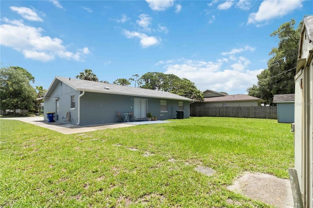 1920 Travelers Palm Dr, Edgewater, FL 32141 - back of property featuring a patio area
