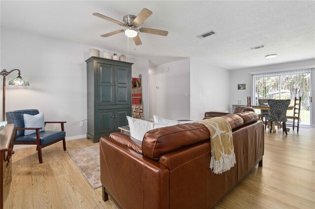1920 Travelers Palm Dr, Edgewater, FL 32141 - living area featuring light wood-style floors and ceiling fan
