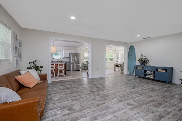 653 Goodwin Ave, New Smyrna Beach, FL 32169 - living room with wood finished floors, recessed lighting, and ceiling fan