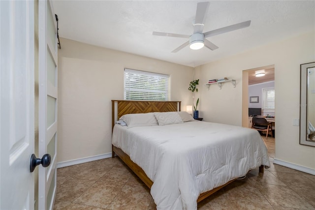 653 Goodwin Ave, New Smyrna Beach, FL 32169 - bedroom with multiple windows and ceiling fan