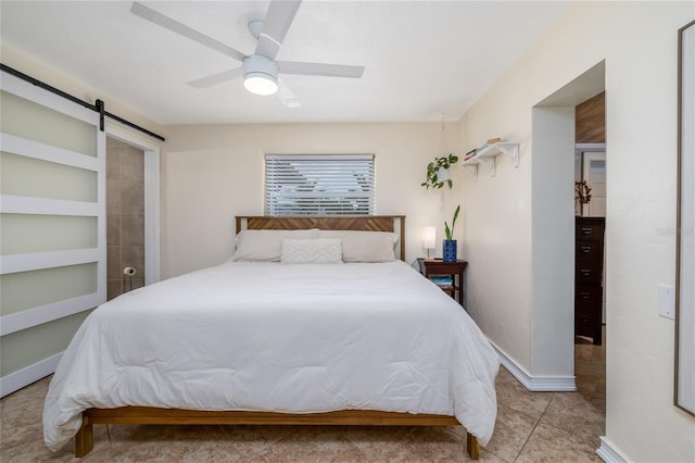 653 Goodwin Ave, New Smyrna Beach, FL 32169 - bedroom featuring a barn door, ceiling fan, and tile patterned floors