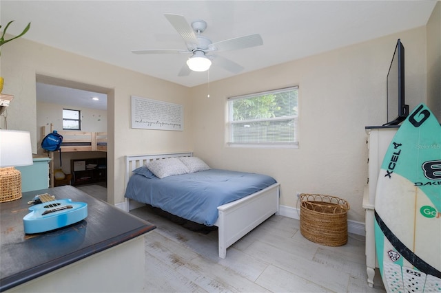 653 Goodwin Ave, New Smyrna Beach, FL 32169 - bedroom featuring multiple windows and ceiling fan