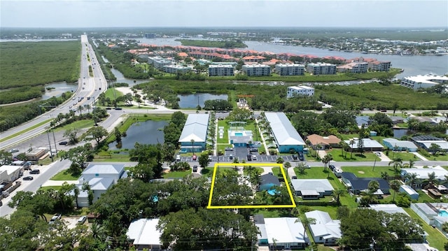 653 Goodwin Ave, New Smyrna Beach, FL 32169 - aerial view of property and surrounding area featuring property boundaries highlighted and a large body of water