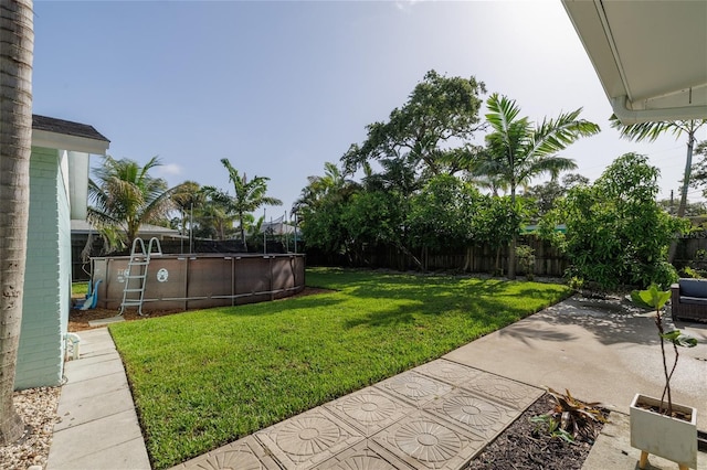 653 Goodwin Ave, New Smyrna Beach, FL 32169 - fenced backyard featuring a patio area