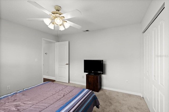 5935 Shady Creek Ln, Port Orange, FL 32128 - bedroom with a closet, carpet, and a ceiling fan