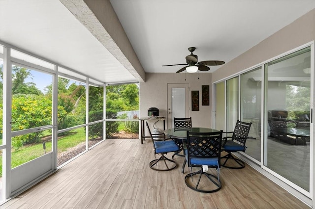 5935 Shady Creek Ln, Port Orange, FL 32128 - sunroom featuring ceiling fan, plenty of natural light, and outdoor dining space