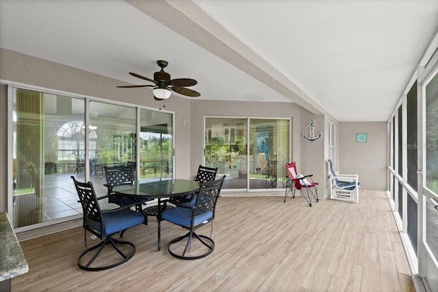 5935 Shady Creek Ln, Port Orange, FL 32128 - sunroom featuring wood finished floors, ceiling fan, and outdoor dining area