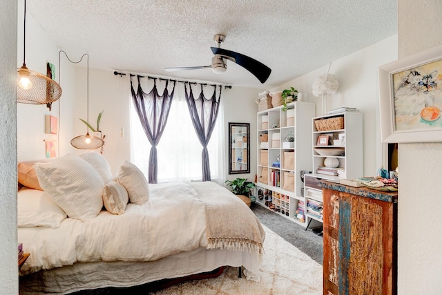 1600 Big Tree Rd Unit R4, South Daytona, FL 32119 - carpeted bedroom with a textured ceiling and ceiling fan