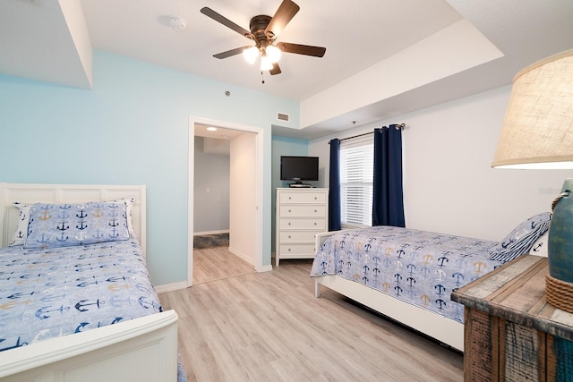 5300 S Atlantic Ave Unit 11302, New Smyrna Beach, FL 32169 - bedroom with wood finished floors, baseboards, and ceiling fan
