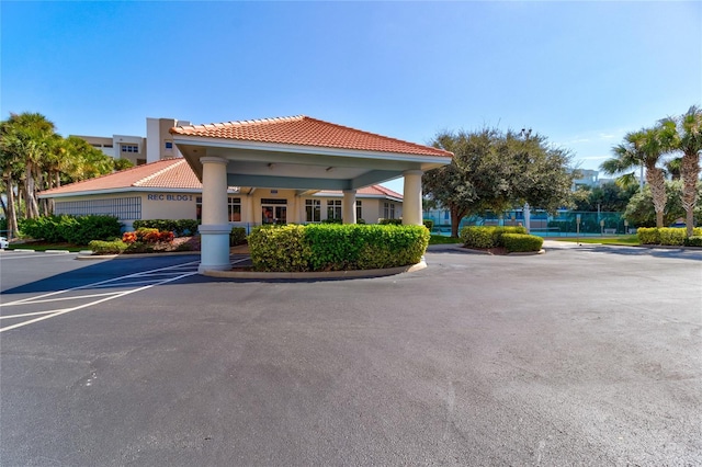 5300 S Atlantic Ave Unit 11302, New Smyrna Beach, FL 32169 - view of property featuring uncovered parking