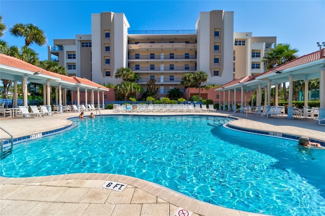 5300 S Atlantic Ave Unit 11302, New Smyrna Beach, FL 32169 - community pool featuring a patio area