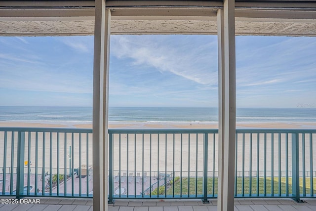 4555 S Atlantic Ave Unit 4405, Ponce Inlet, FL 32127 - unfurnished sunroom with view of water and beach
