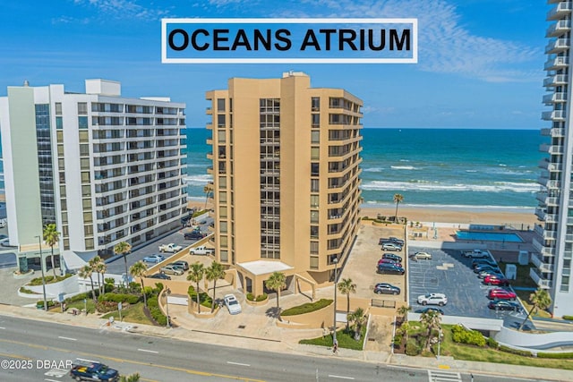 3023 S Atlantic Ave Unit 8010, Daytona Beach, FL 32118 - view of apartment building / complex with view of water and beach