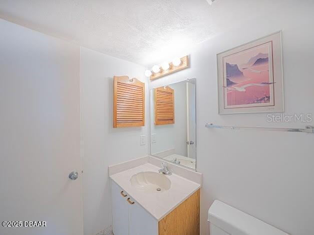 3023 S Atlantic Ave Unit 8010, Daytona Beach, FL 32118 - bathroom with vanity and toilet