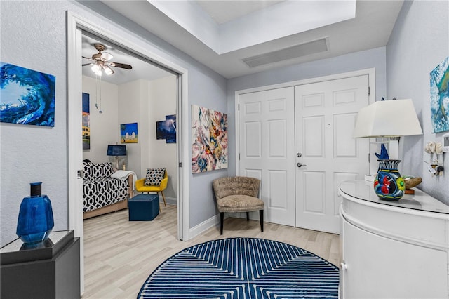 2 Oceans W Blvd Unit 608, Daytona Beach Shores, FL 32118 - sitting room with wood finished floors, ceiling fan, and baseboards
