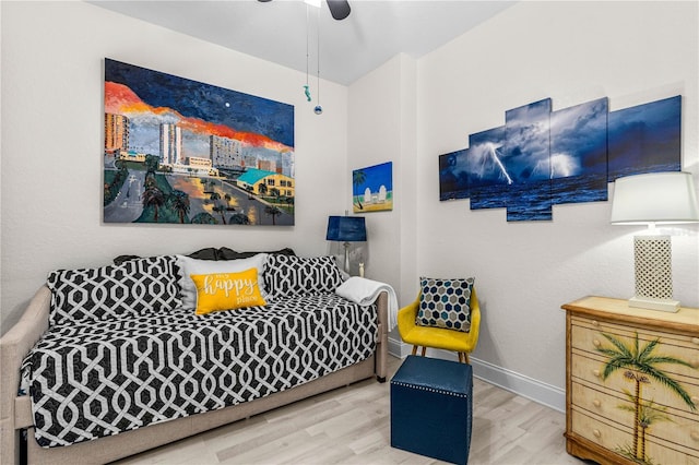 2 Oceans W Blvd Unit 608, Daytona Beach Shores, FL 32118 - living area with wood finished floors, ceiling fan, and baseboards