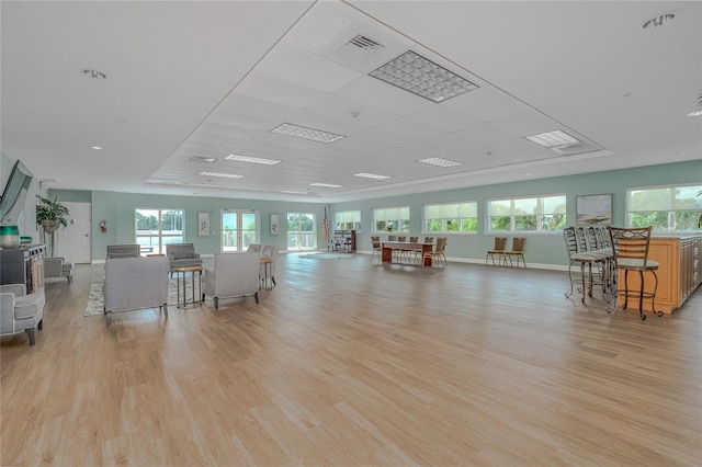 2 Oceans W Blvd Unit 608, Daytona Beach Shores, FL 32118 - living area featuring light wood-style floors, healthy amount of natural light, and baseboards