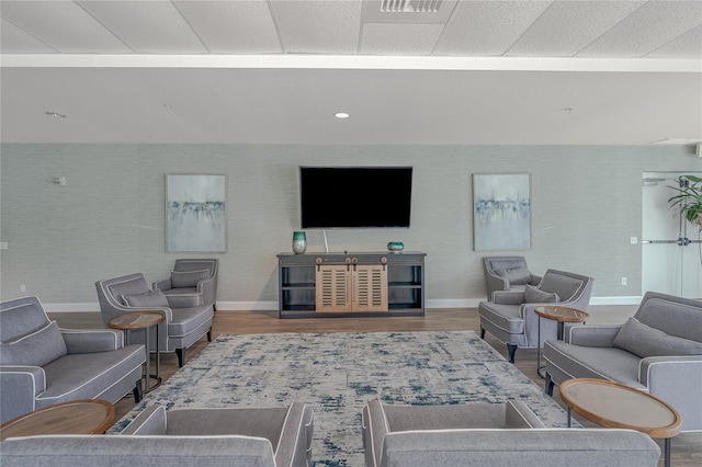 2 Oceans W Blvd Unit 608, Daytona Beach Shores, FL 32118 - living room featuring baseboards and wood finished floors