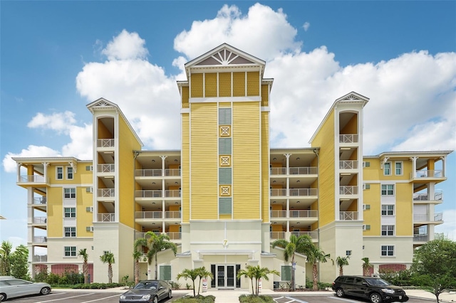 7 Riverwalk Dr Unit 305, New Smyrna Beach, FL 32169 - view of apartment building / complex with uncovered parking