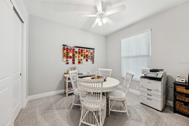 7 Riverwalk Dr Unit 305, New Smyrna Beach, FL 32169 - dining room with a ceiling fan, light colored carpet, baseboards, and an office area