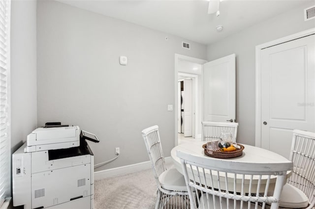 7 Riverwalk Dr Unit 305, New Smyrna Beach, FL 32169 - carpeted dining area with baseboards