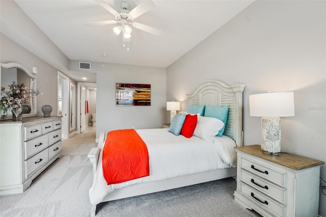 7 Riverwalk Dr Unit 305, New Smyrna Beach, FL 32169 - bedroom featuring light carpet and a ceiling fan