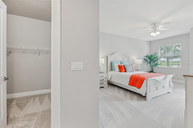 7 Riverwalk Dr Unit 305, New Smyrna Beach, FL 32169 - carpeted bedroom featuring baseboards, ceiling fan, and a closet