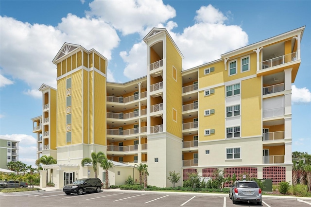 7 Riverwalk Dr Unit 305, New Smyrna Beach, FL 32169 - view of apartment building / complex with uncovered parking