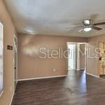 1802 N Fern Palm Dr, Edgewater, FL 32132 - empty room with baseboards and ceiling fan