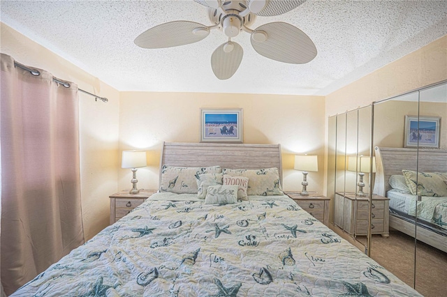 3615 S Atlantic Ave Unit 211, Daytona Beach, FL 32118 - carpeted bedroom featuring a textured ceiling and a ceiling fan