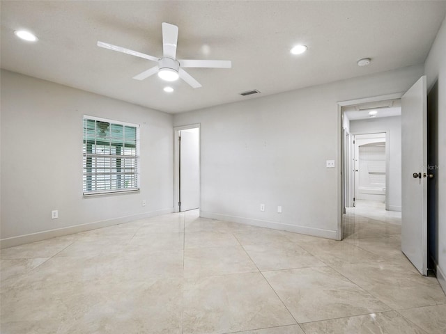 2 Birdie Dr, New Smyrna Beach, FL 32168 - empty room featuring recessed lighting and ceiling fan