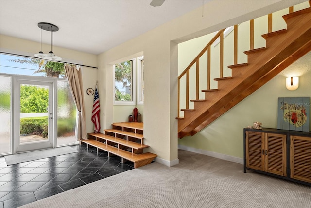 6956 Turtlemound Rd, New Smyrna Beach, FL 32169 - staircase featuring baseboards