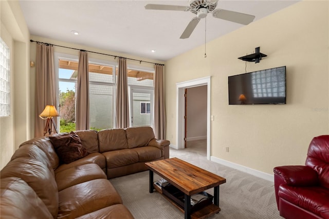 6956 Turtlemound Rd, New Smyrna Beach, FL 32169 - living room with carpet flooring and a ceiling fan