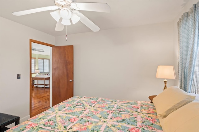 6956 Turtlemound Rd, New Smyrna Beach, FL 32169 - bedroom featuring ceiling fan and wood finished floors