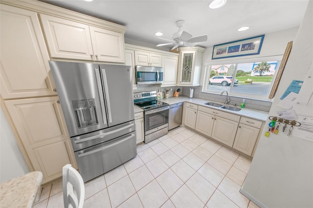 4777 S Atlantic Ave Unit B2, Port Orange, FL 32127 - kitchen with stainless steel appliances, light countertops, decorative backsplash, recessed lighting, and light tile patterned floors