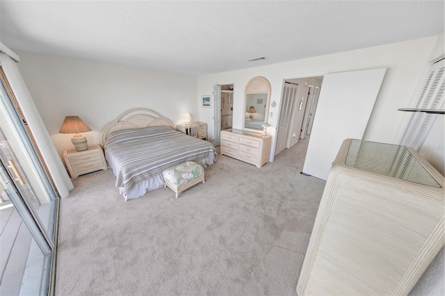 4777 S Atlantic Ave Unit B2, Port Orange, FL 32127 - bedroom with light colored carpet