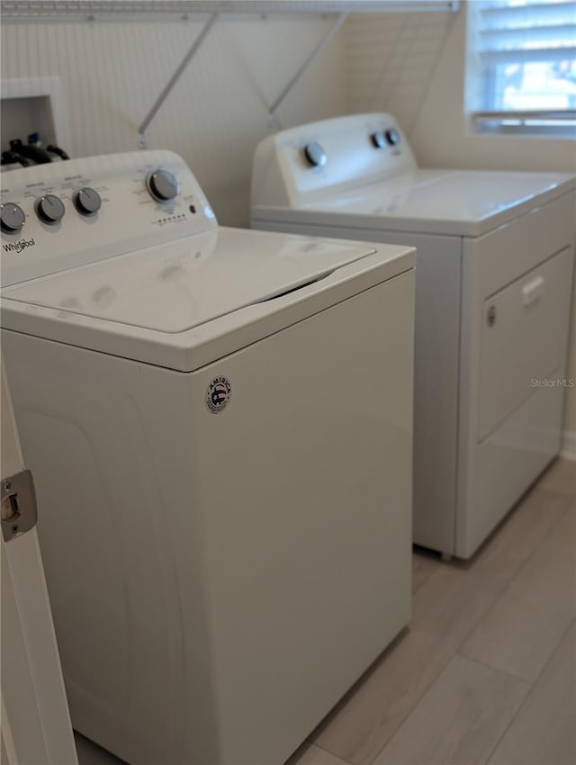 3103 Nova Scotia Way, New Smyrna Beach, FL 32168 - laundry area with washing machine and dryer